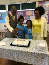 Cutting the cake with family